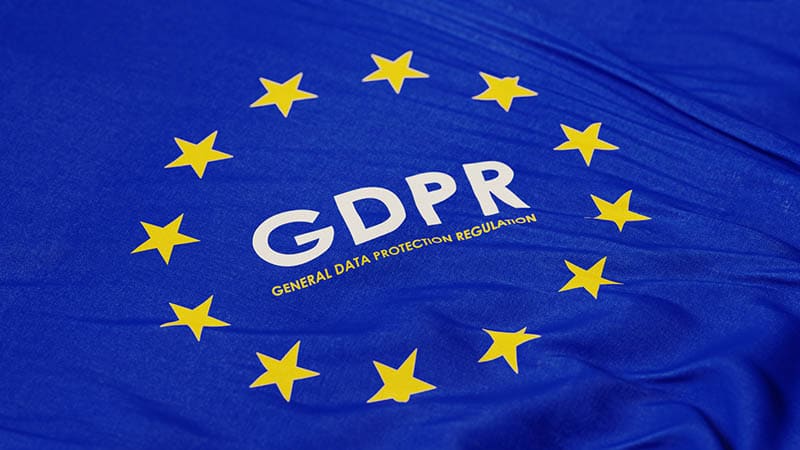 EU-flagget med teksten GDPR som står for General Data Protection Regulation, som representerer EUs personvernregler og standarder for beskyttelse av personopplysninger.